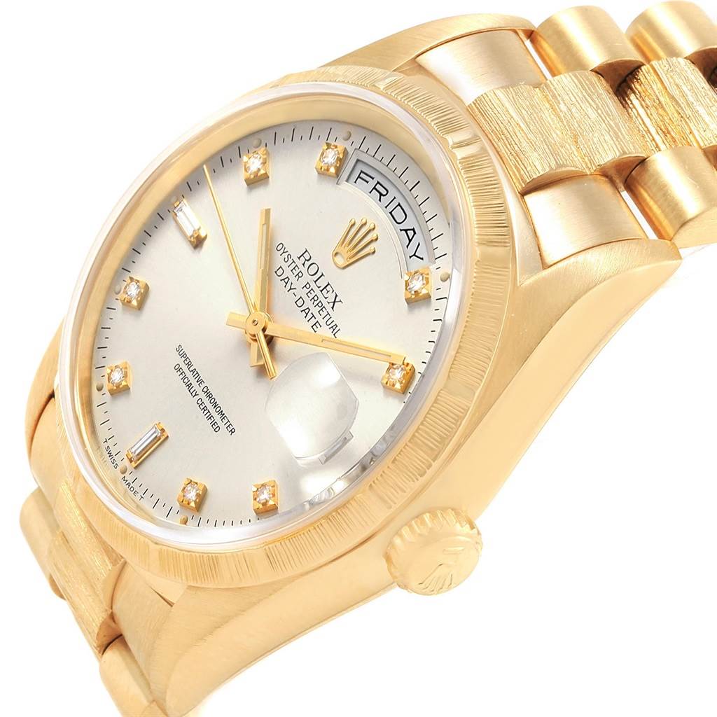 This image shows a side view of the Rolex President 18248 Men's Yellow Gold Silver Dial 18248 Men's Yellow Gold Silver Dial watch, highlighting the dial, crown, and bracelet.