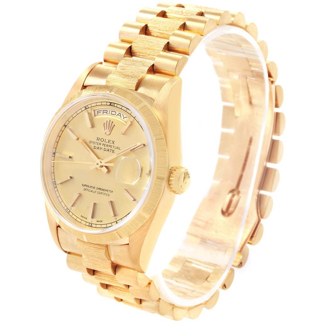 This image shows a side angle of the Rolex President 18248 Men's Yellow Gold Champagne Dial 18248 Men's Yellow Gold Champagne Dial model watch, highlighting its golden case, bracelet, and dial.