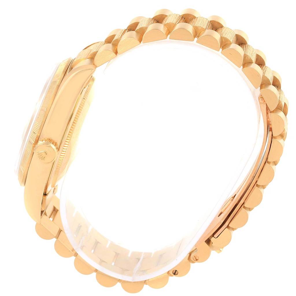 This image shows a side view of the Rolex President 18248 Men's Yellow Gold Champagne Dial 18248 Men's Yellow Gold Champagne Dial model watch, focusing on the gold bracelet and case.