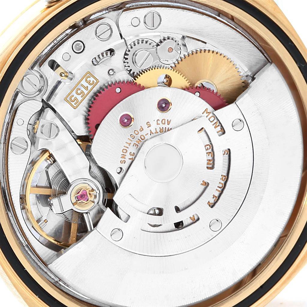 This image shows a close-up of the internal mechanism and movement of a Rolex President 18248 Men's Yellow Gold Champagne Dial 18248 Men's Yellow Gold Champagne Dial watch.