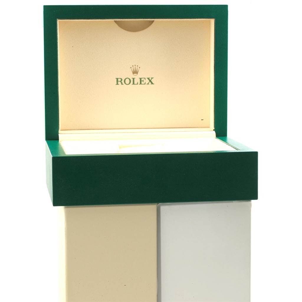 The image shows an open green Rolex watch box, likely for a Rolex President 118208 Men
s Yellow Gold Black Dial 118208 Men
s Yellow Gold Black Dial model, viewed from the front.