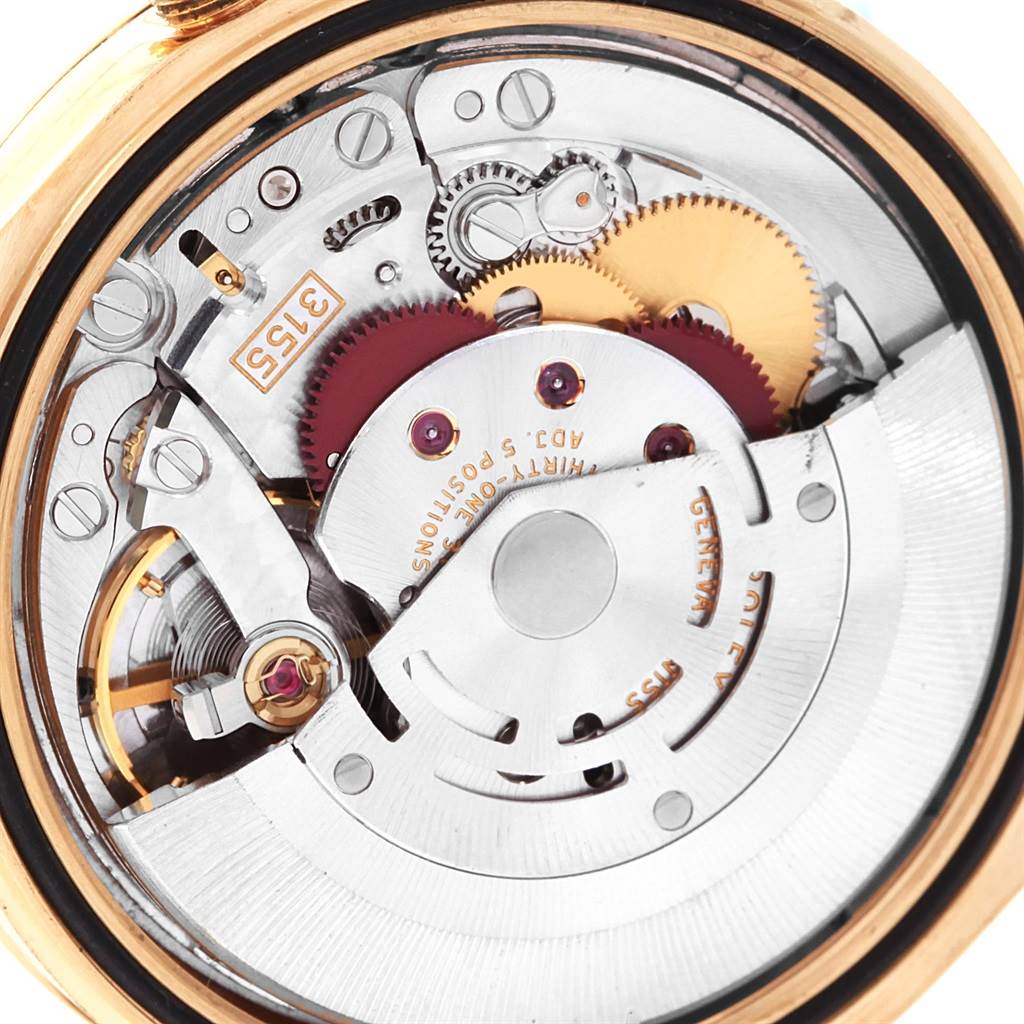 This image shows a close-up view of the internal mechanism of a Rolex President 118208 Men
s Yellow Gold Black Dial 118208 Men
s Yellow Gold Black Dial model watch.