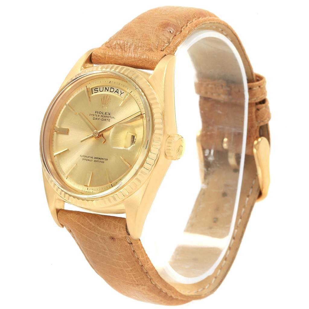 The Rolex President 1803 Men's Yellow Gold Champagne Dial 1803 Men's Yellow Gold Champagne Dial model watch is shown from a three-quarter angle, displaying its dial, bezel, crown, and leather strap.