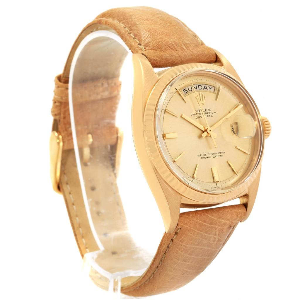 The image depicts a side angle of the Rolex President 1803 Men's Yellow Gold Champagne Dial 1803 Men's Yellow Gold Champagne Dial model watch, showcasing the watch face, bezel, crown, and leather strap.