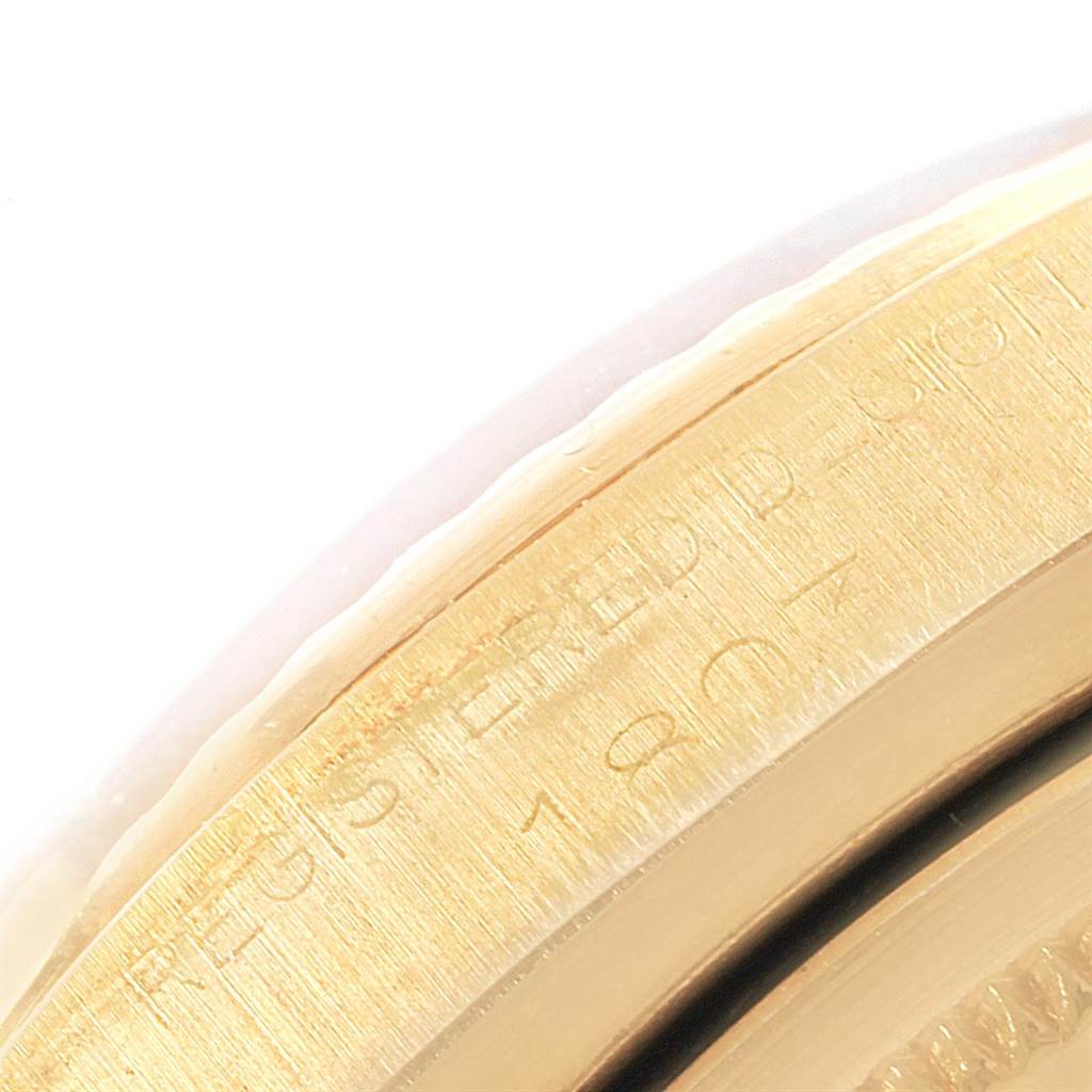 This image shows a close-up of the edge of the case of a Rolex President 1803 Men's Yellow Gold Champagne Dial 1803 Men's Yellow Gold Champagne Dial model.