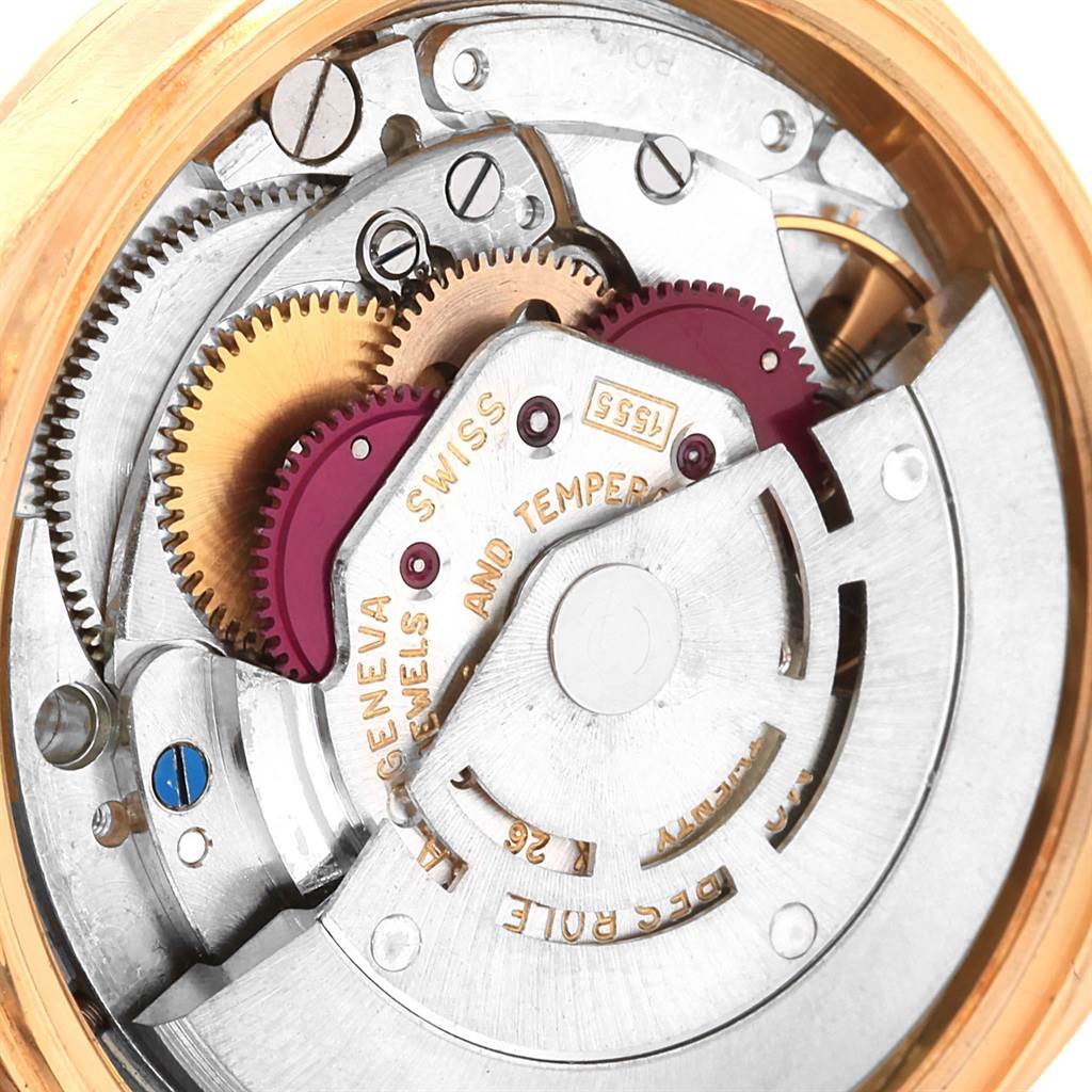 The image shows an internal view of the Rolex President 1807 Men
s Yellow Gold Champagne Dial 1807 Men
s Yellow Gold Champagne Dial model watch, highlighting its intricate mechanical movement.