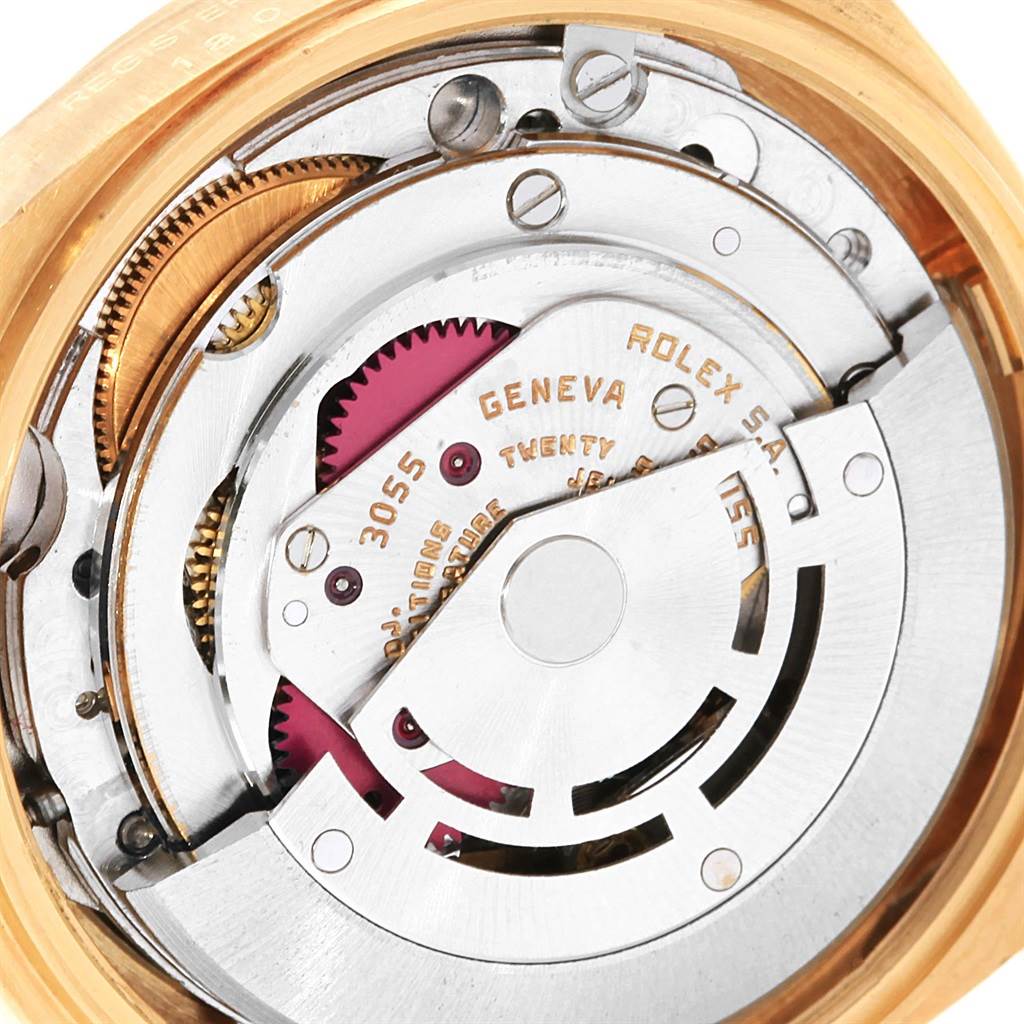 The image shows a close-up view of the Rolex President 18078 Men
s Yellow Gold Black Dial 18078 Men
s Yellow Gold Black Dial model
s watch movement from the back.
