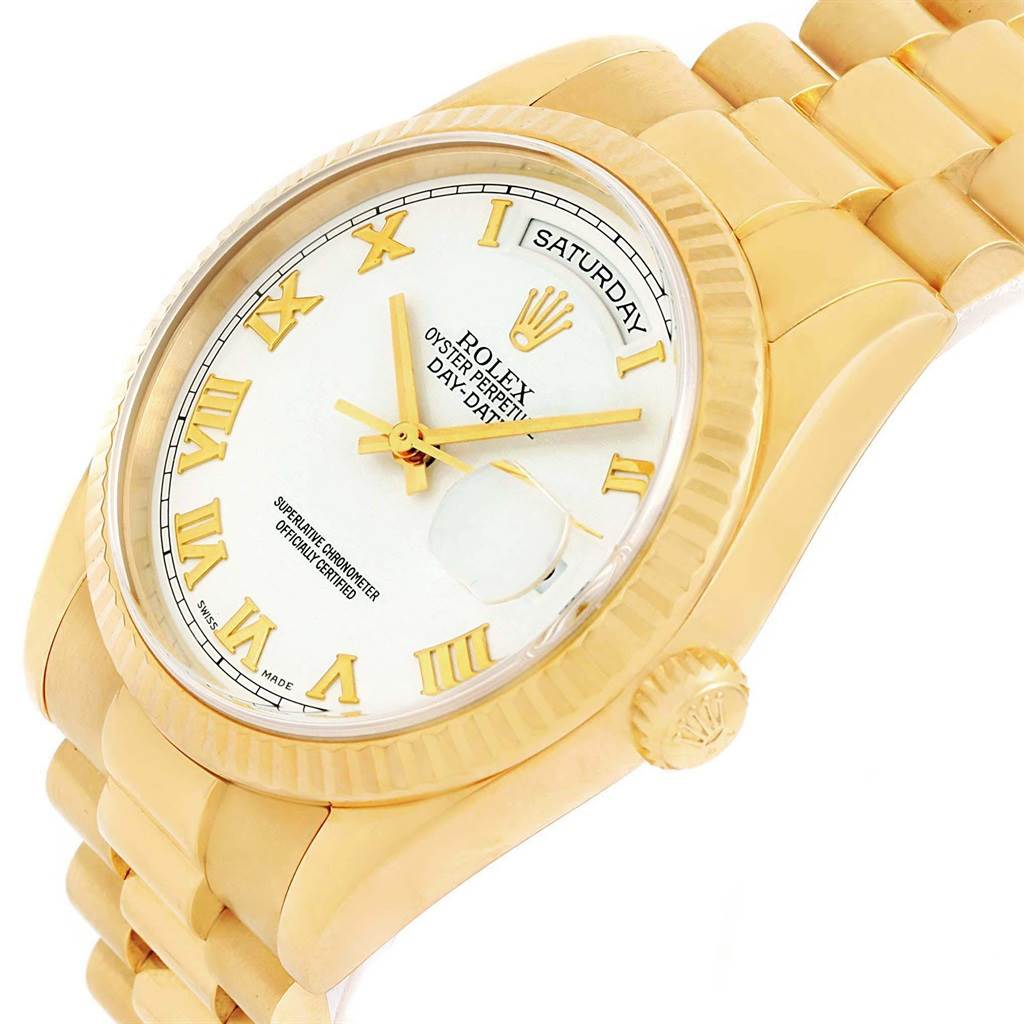 This image shows a close-up of a gold Rolex President 118238 Men
s Yellow Gold White Dial 118238 Men
s Yellow Gold White Dial model watch, highlighting the dial, bezel, crown, and part of the bracelet.
