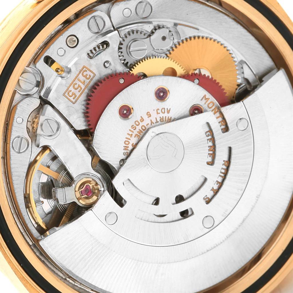 The image shows a close-up view of the internal mechanical movement of a Rolex President 18238 Men
s Yellow Gold White Dial 18238 Men
s Yellow Gold White Dial model watch.