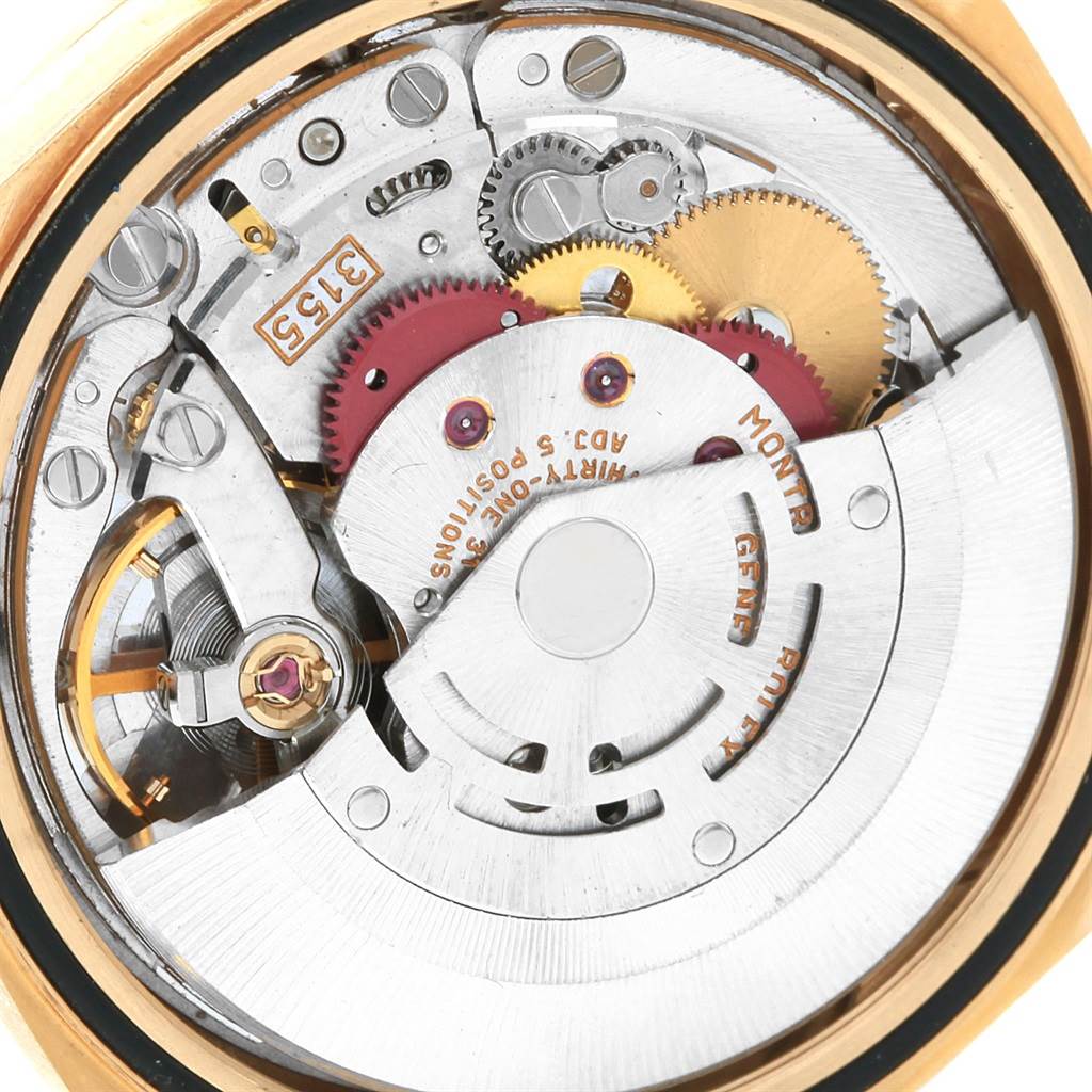 This image shows the internal mechanical movement of the Rolex President 18238 Men
s Yellow Gold Champagne Dial 18238 Men
s Yellow Gold Champagne Dial model from a close-up angle.