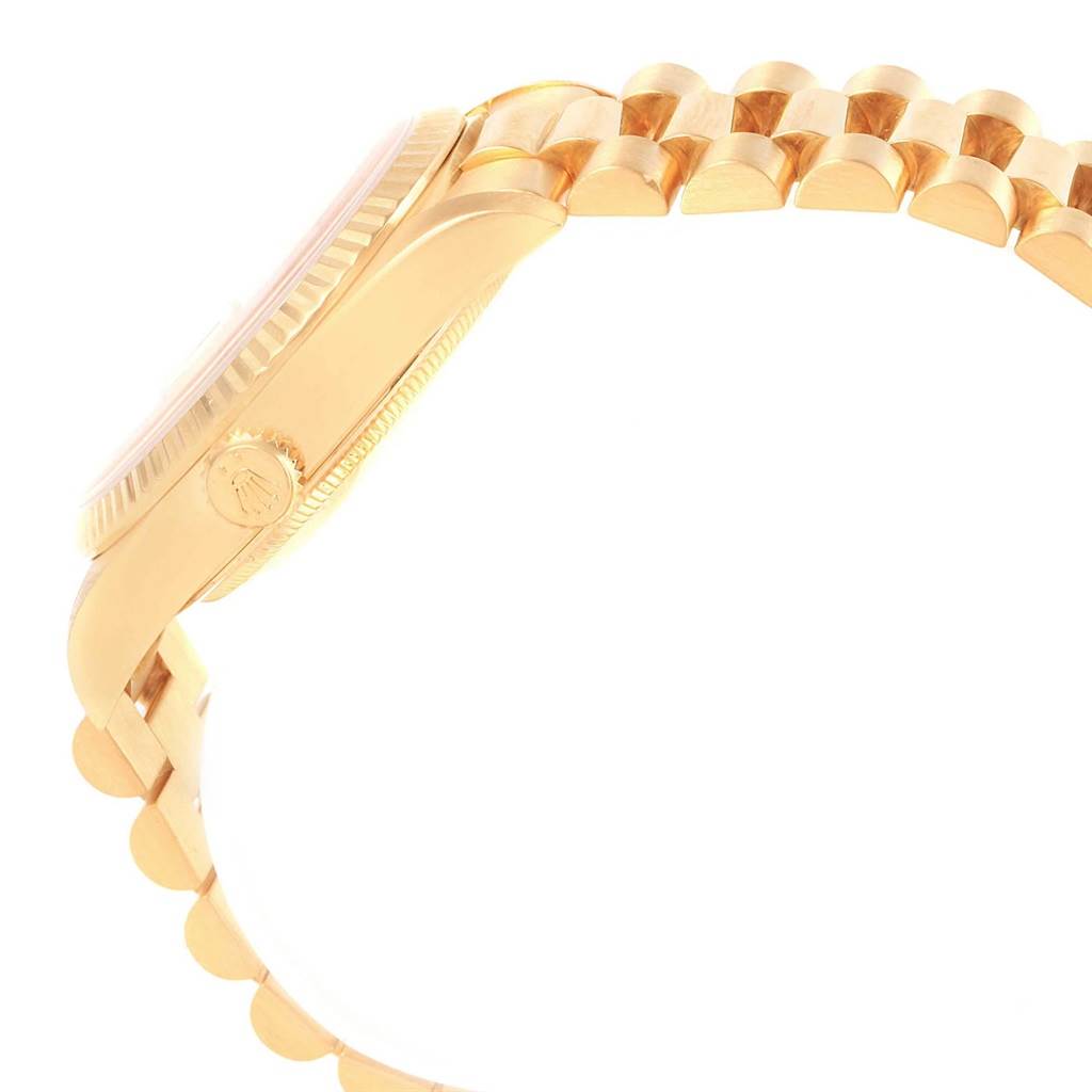 The image shows a side view of the Rolex President 18238 Men
s Yellow Gold Champagne Dial 18238 Men
s Yellow Gold Champagne Dial watch model, highlighting its case, crown, and part of the bracelet.