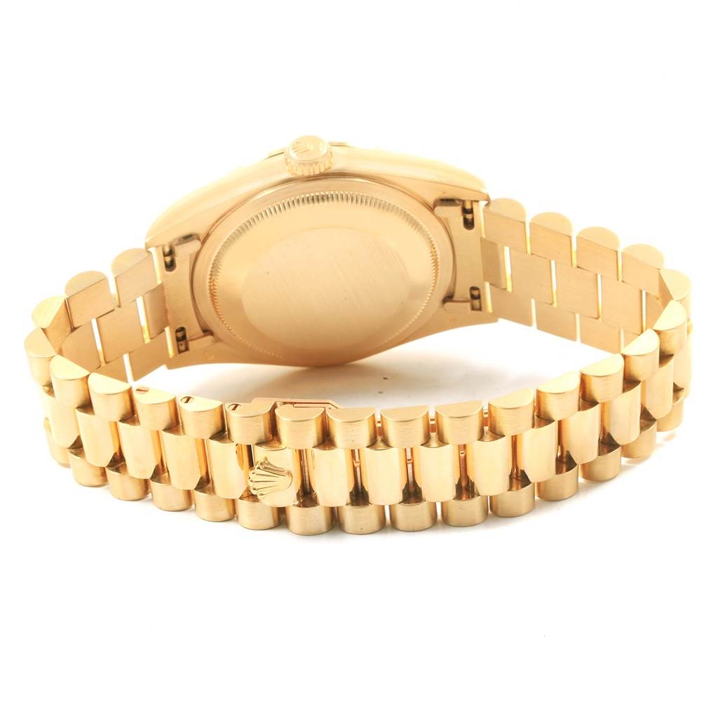 This image shows the back view of a Rolex President 18238 Men
s Yellow Gold Champagne Dial 18238 Men
s Yellow Gold Champagne Dial model watch, displaying its gold case and bracelet.