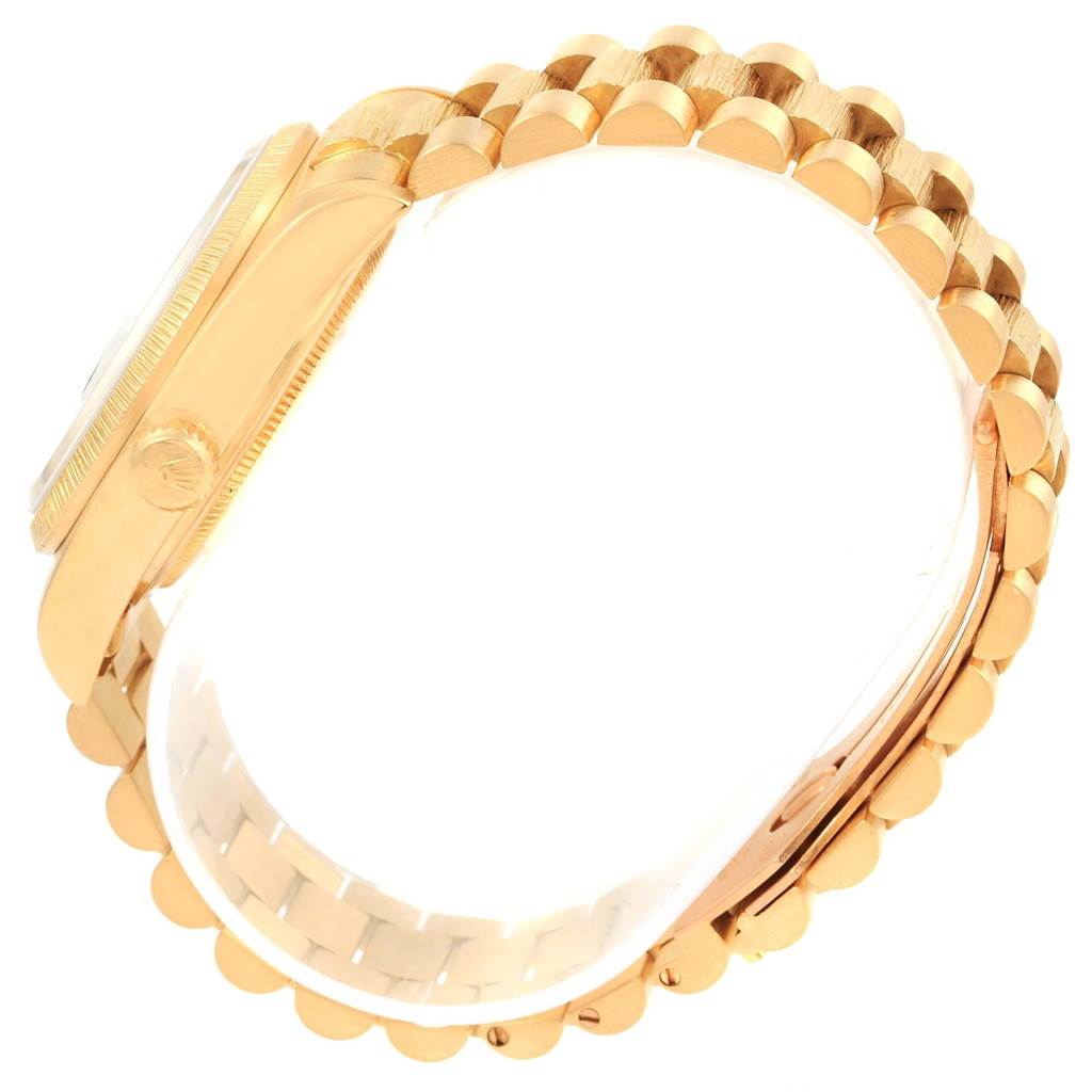 This image shows a side and partial band view of the Rolex President 18078 Men's Yellow Gold Black Dial 18078 Men's Yellow Gold Black Dial model watch.