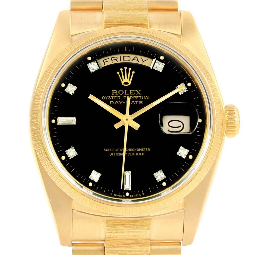 This image shows a Rolex President 18078 Men's Yellow Gold Black Dial 18078 Men's Yellow Gold Black Dial model watch from a front angle, highlighting its gold case, black dial, and date window.