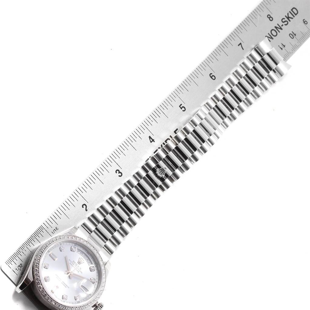 The image shows the watch face and bracelet band of a Rolex President 118206 Men's Platinum Blue Dial 118206 Men's Platinum Blue Dial model from a top-down angle with a ruler for scale.