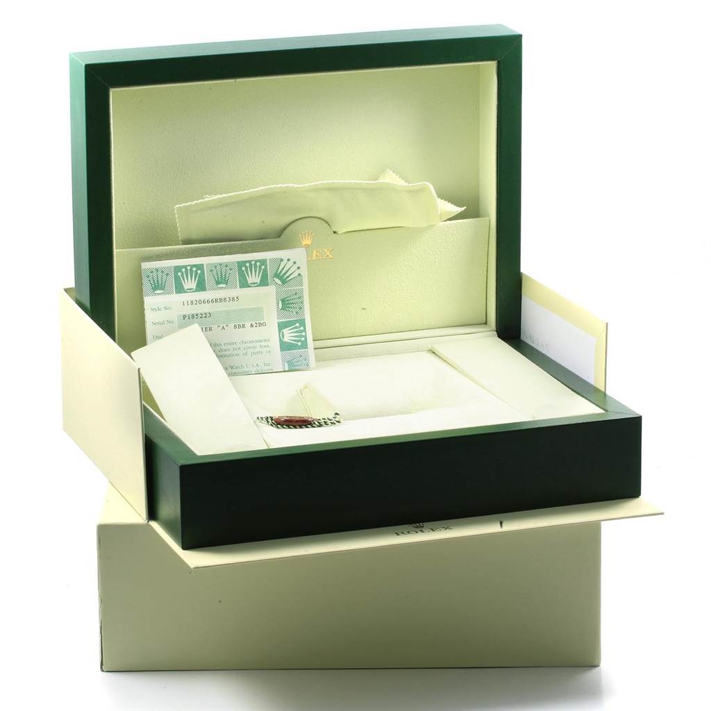 The image shows the open packaging box for a Rolex President 118206 Men's Platinum Blue Dial 118206 Men's Platinum Blue Dial model, including documentation and watch accessories from a top-angle view.
