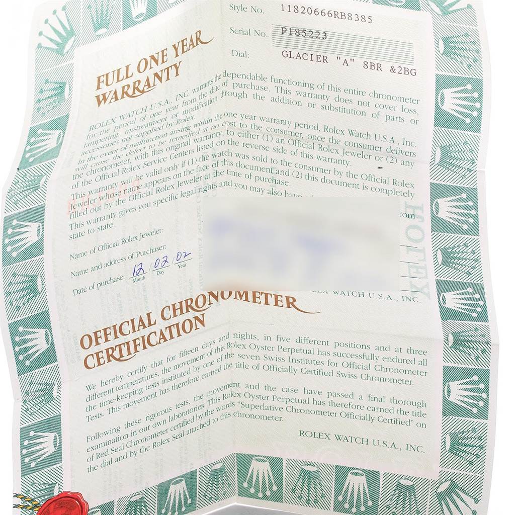 This image shows the warranty and certification documents for a Rolex President 118206 Men's Platinum Blue Dial 118206 Men's Platinum Blue Dial model watch.