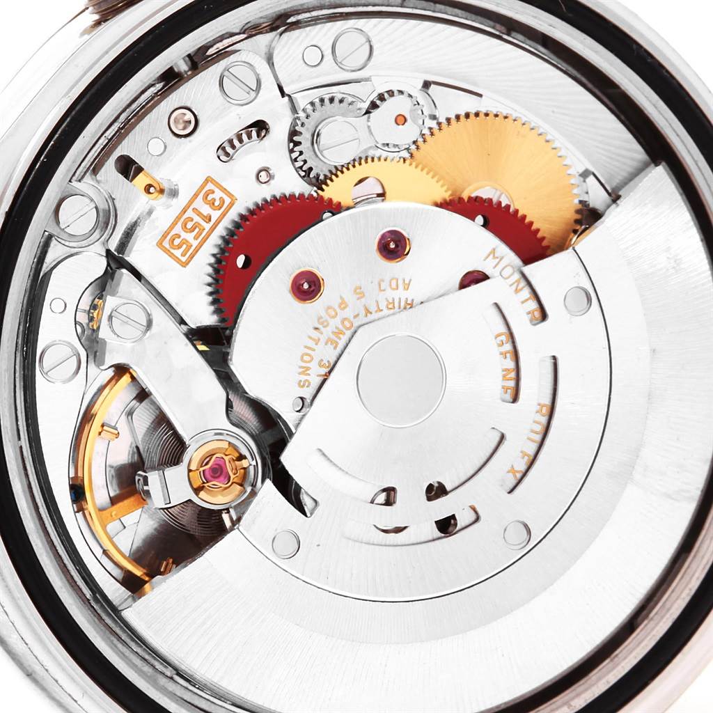 This image shows the inner mechanical movement of a Rolex President 118206 Men's Platinum Blue Dial 118206 Men's Platinum Blue Dial model watch at a close-up angle.