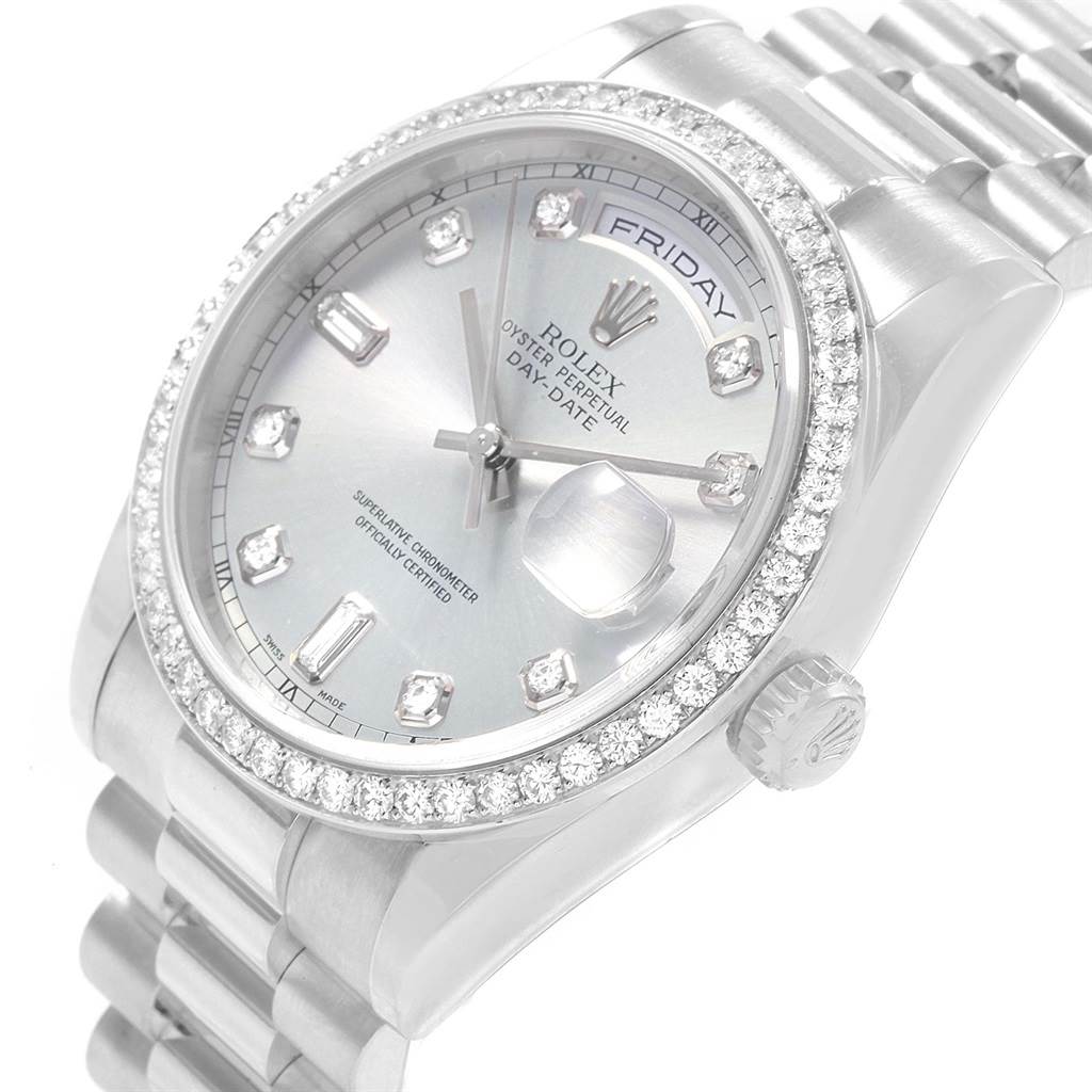 This image shows a close-up angle of a Rolex President 118206 Men's Platinum Blue Dial 118206 Men's Platinum Blue Dial model watch displaying the dial, bezel, and part of the bracelet.