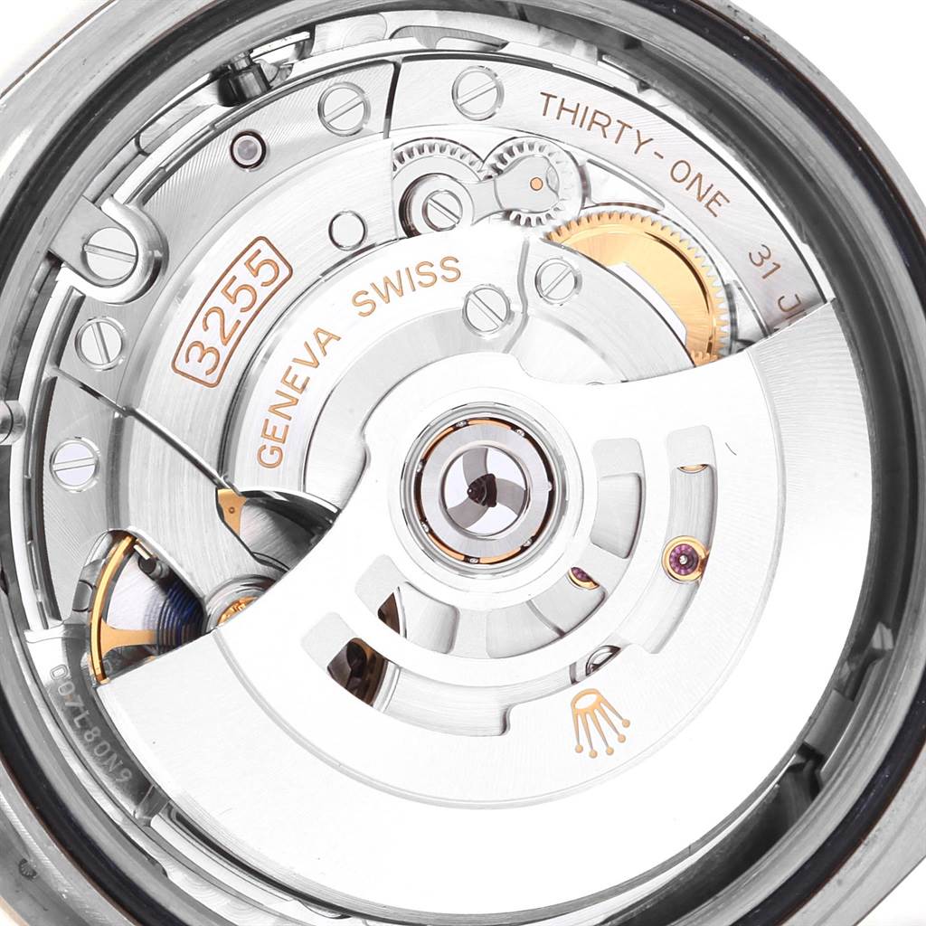 The image shows the intricate internal mechanism of a Rolex President 228239 Men's White Gold Silver Dial 228239 Men's White Gold Silver Dial model watch, viewed from the back.