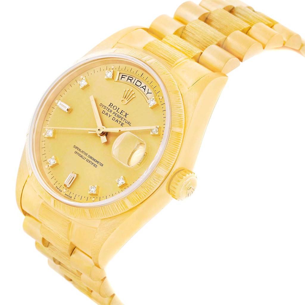 The Rolex President 18078 Men
s Yellow Gold Champagne Dial 18078 Men
s Yellow Gold Champagne Dial model watch is shown at a 3/4 angle, highlighting the band, face, and crown.