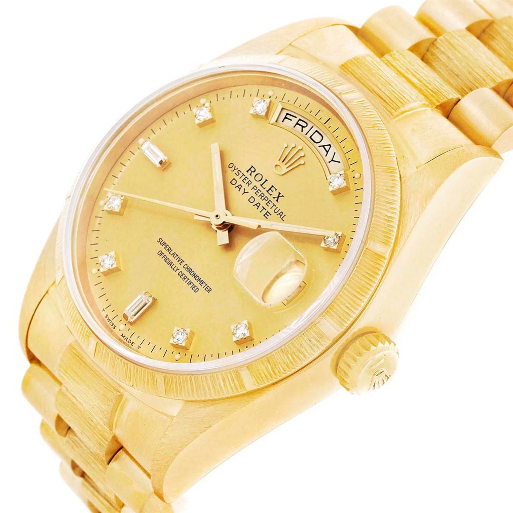 The image shows a Rolex President 18078 Men
s Yellow Gold Champagne Dial 18078 Men
s Yellow Gold Champagne Dial watch from a slightly angled top view, highlighting the dial, bezel, day-date window, and bracelet.