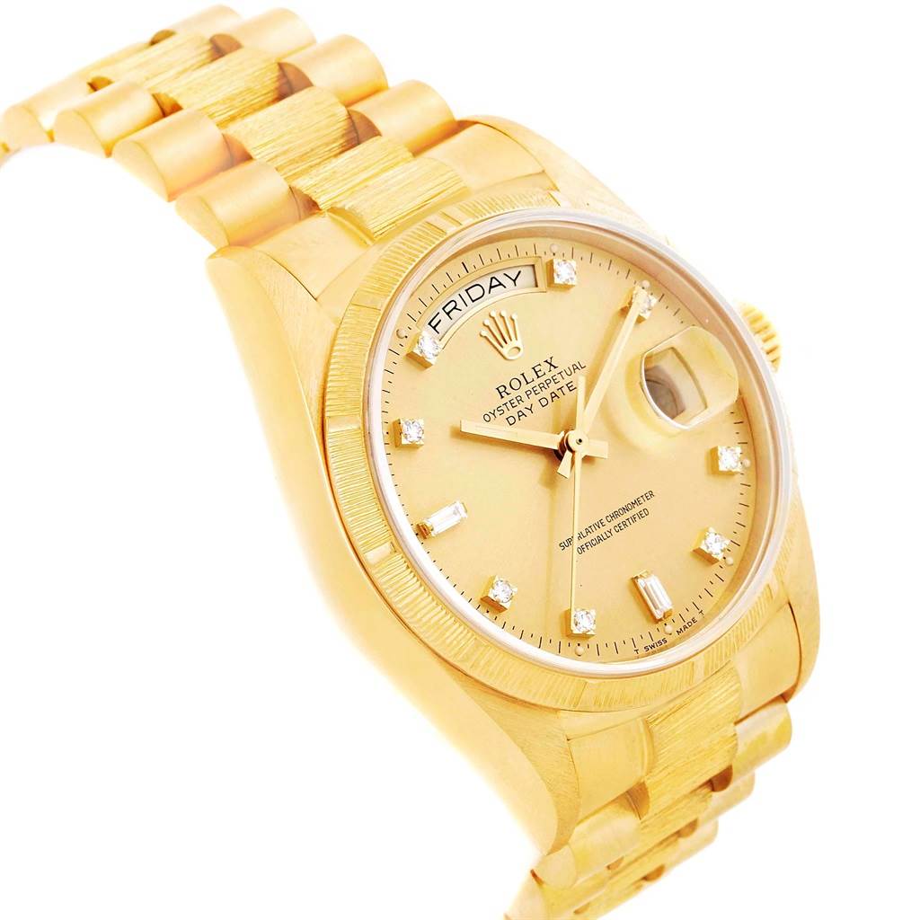 This is a close-up view of the Rolex President 18078 Men
s Yellow Gold Champagne Dial 18078 Men
s Yellow Gold Champagne Dial model watch, displaying the face, dial, and part of the bracelet.