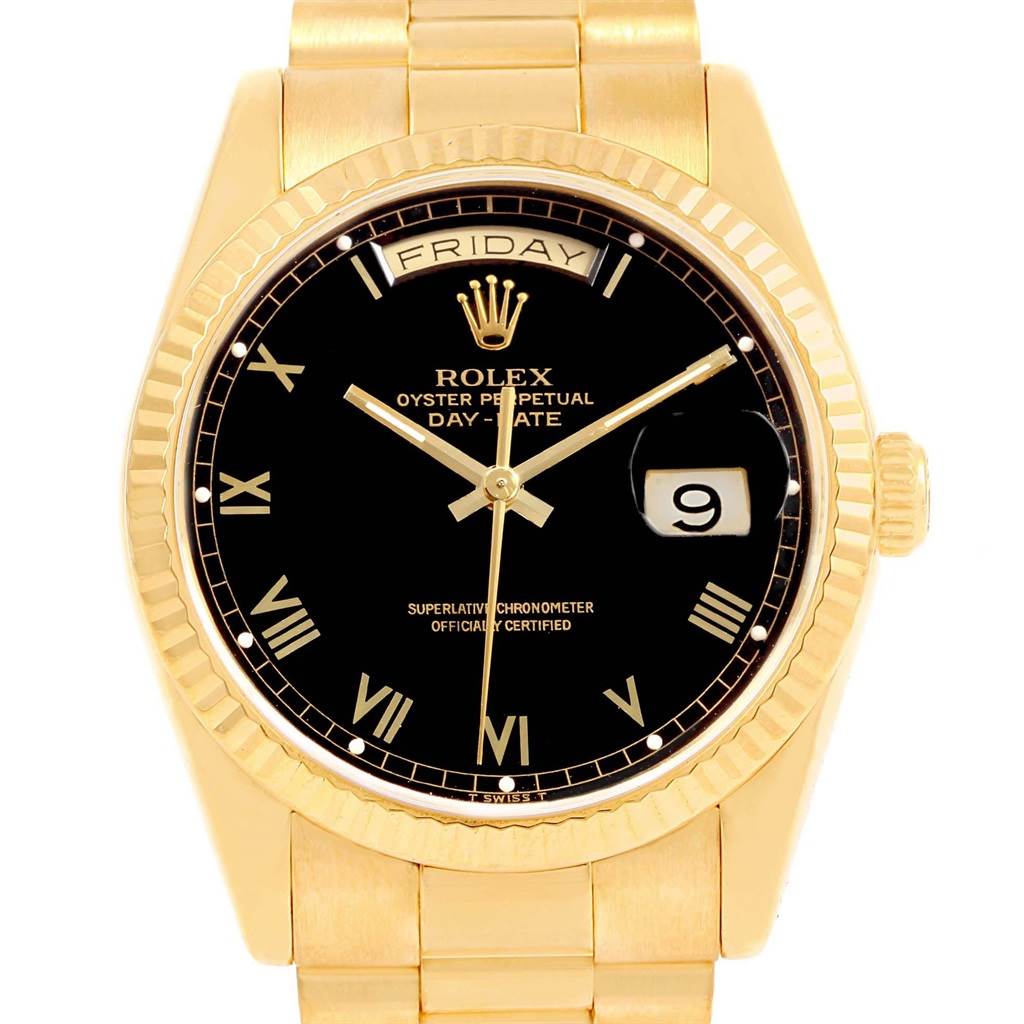 The image shows a Rolex President 18238 Men
s Yellow Gold Black Dial 18238 Men
s Yellow Gold Black Dial model watch from a frontal angle, highlighting its black dial, gold case, and bracelet.