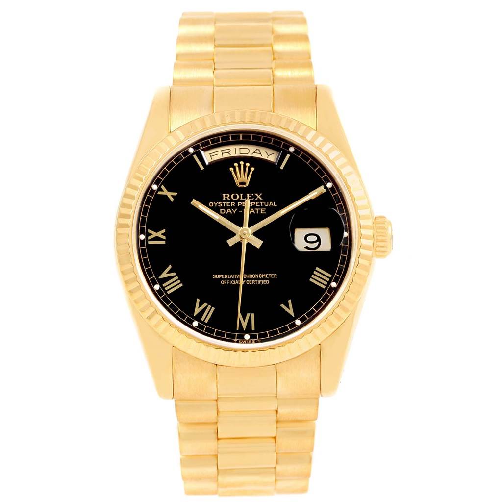 The image shows a front view of the Rolex President 18238 Men
s Yellow Gold Black Dial 18238 Men
s Yellow Gold Black Dial model watch, displaying its black dial, date window, and gold bracelet.