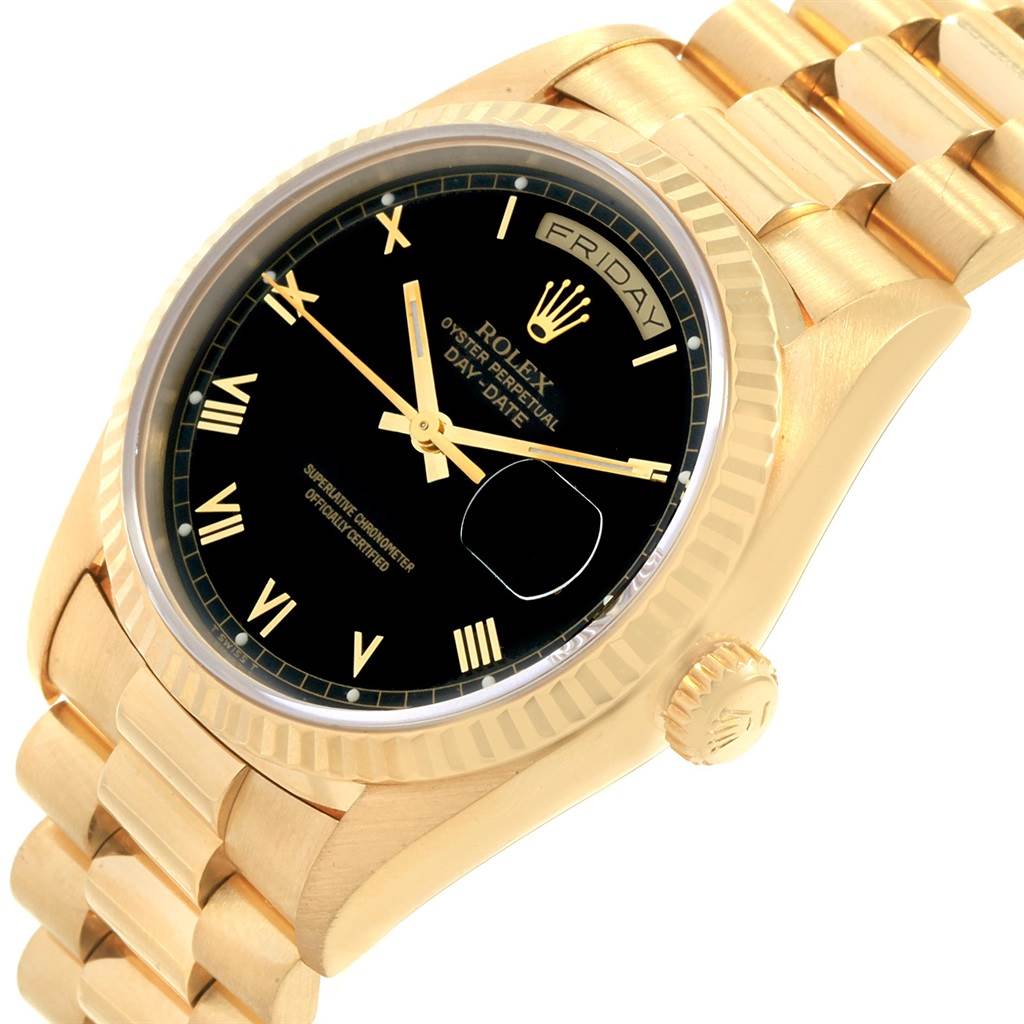 This image shows a close-up angle of the face and bracelet of a gold Rolex President 18238 Men
s Yellow Gold Black Dial 18238 Men
s Yellow Gold Black Dial model watch.