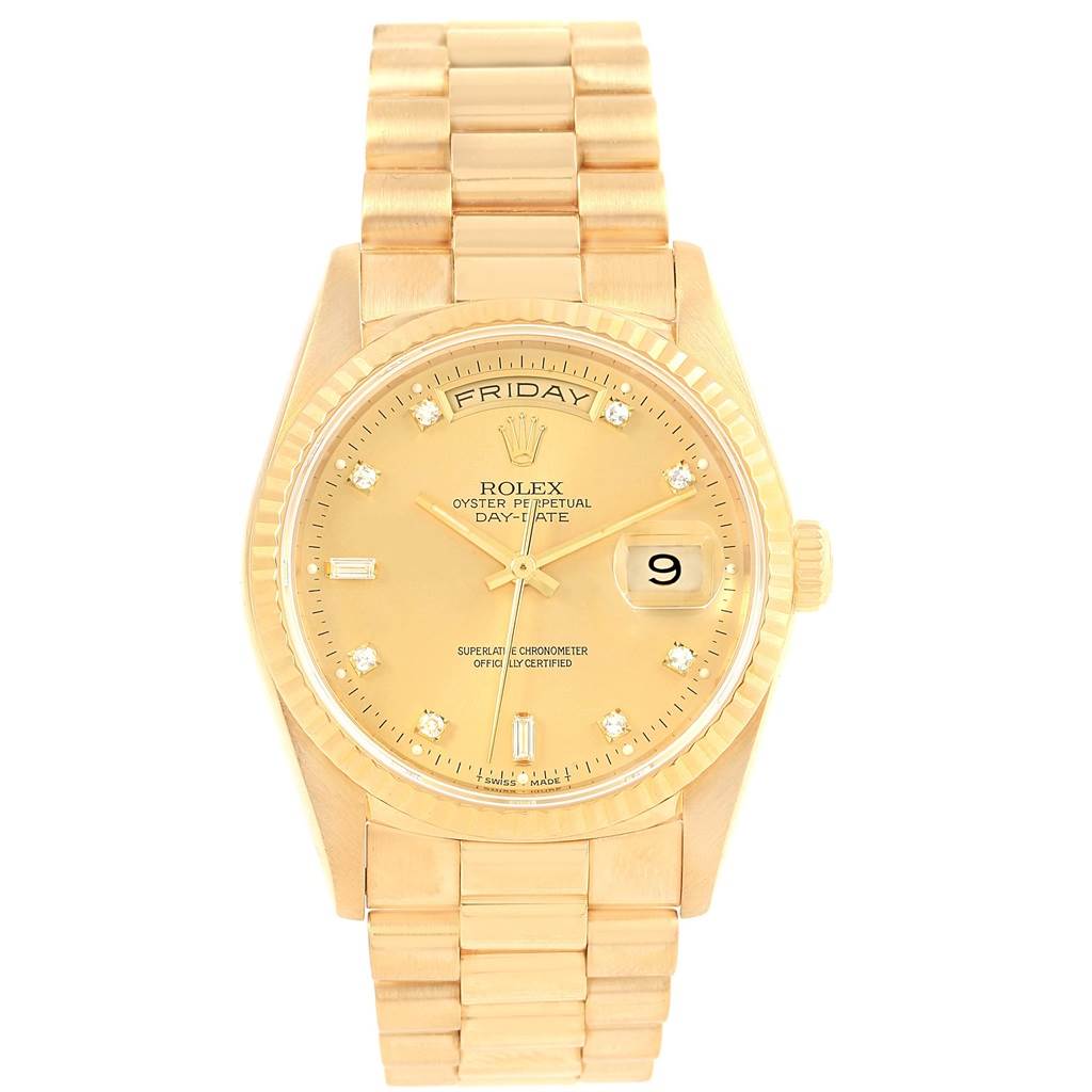 The image shows a front view of a Rolex President 18238 Men's Yellow Gold Champagne Dial 18238 Men's Yellow Gold Champagne Dial model, displaying the dial, day, date, and part of the bracelet.