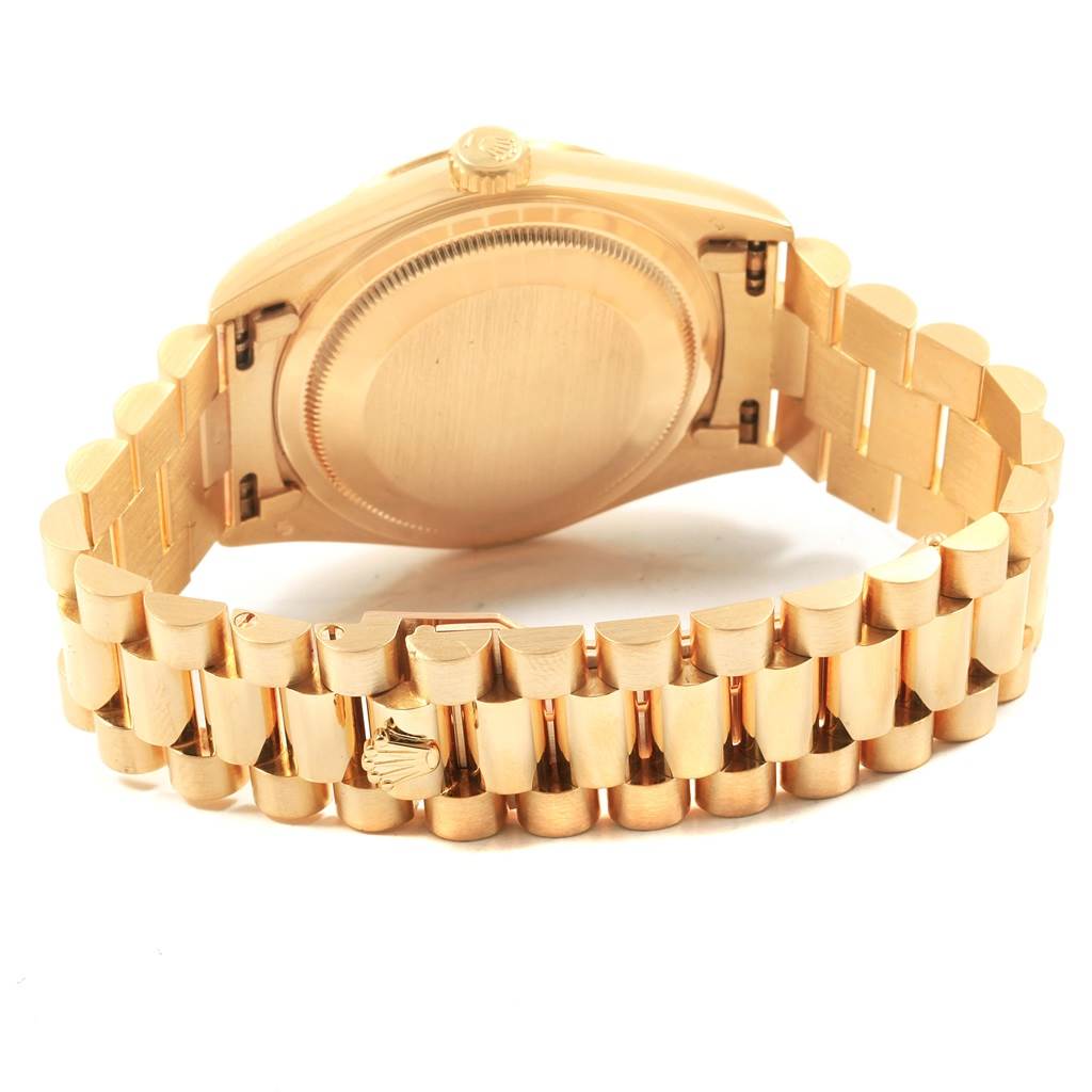 This image shows the back case and bracelet of a Rolex President 18238 Men's Yellow Gold Champagne Dial 18238 Men's Yellow Gold Champagne Dial model watch, viewed from behind.