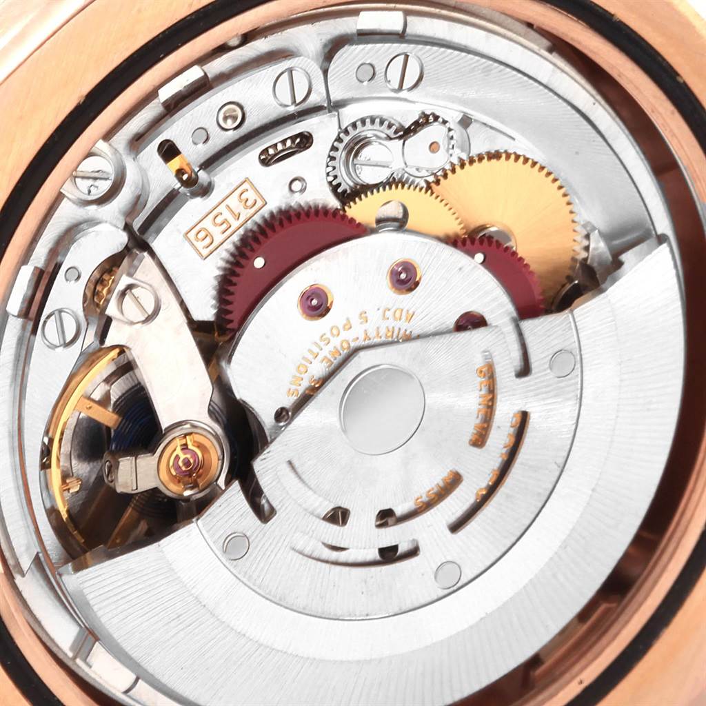 The image shows the intricate internal mechanism of the Rolex President 218235 Men's Rose Gold Pink Dial 218235 Men's Rose Gold Pink Dial model watch from a close-up angle.
