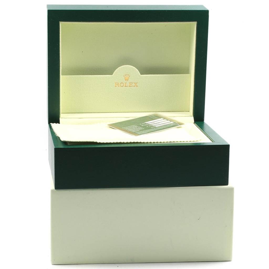 The image shows an open box for a Rolex President 218235 Men's Rose Gold Pink Dial 218235 Men's Rose Gold Pink Dial model watch, including a cleaning cloth and a card.