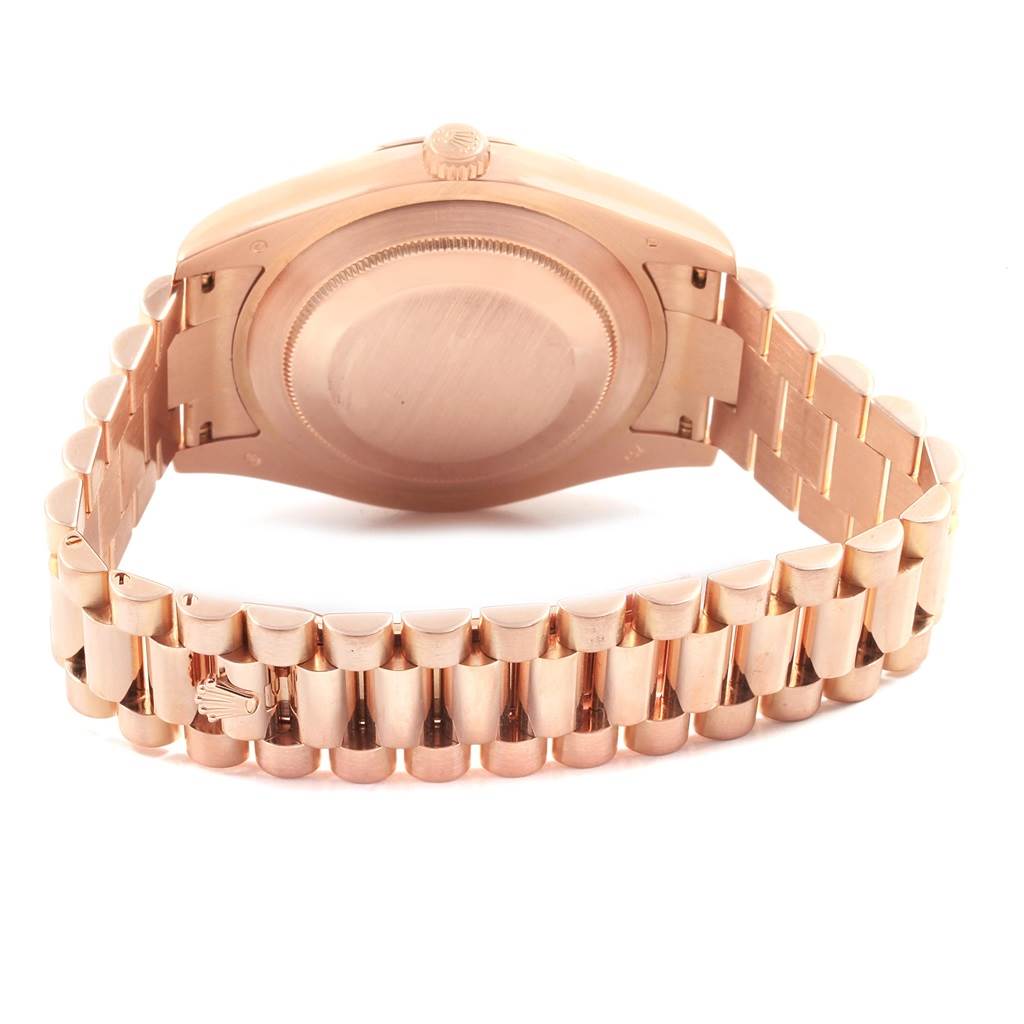The image shows the back case and bracelet of a Rolex President 218235 Men's Rose Gold Pink Dial 218235 Men's Rose Gold Pink Dial model watch.