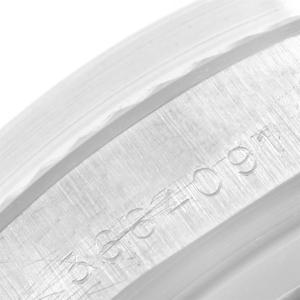 This image shows a close-up of the serial number engraving on the case of the Rolex President 1803 Men
s White Gold Black Dial 1803 Men
s White Gold Black Dial model watch.