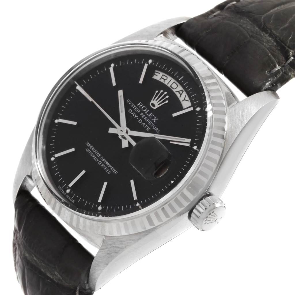 The image shows a close-up angle of the Rolex President 1803 Men
s White Gold Black Dial 1803 Men
s White Gold Black Dial watch, showcasing the dial, bezel, crown, and part of the strap.