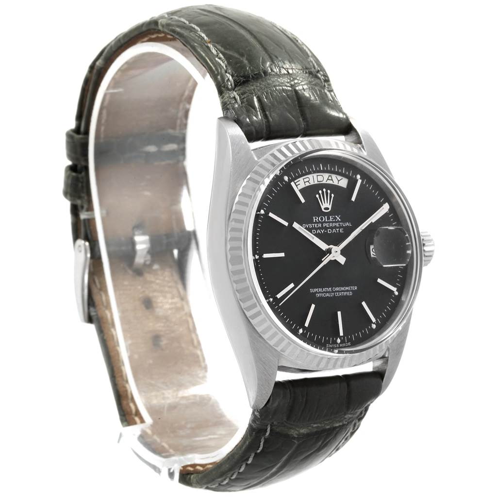 The image shows a side view of the Rolex President 1803 Men
s White Gold Black Dial 1803 Men
s White Gold Black Dial watch with its black leather strap, silver case, and black dial.