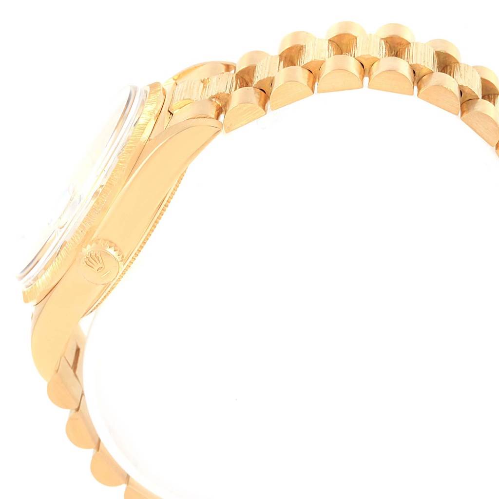 The image shows the side profile and bracelet of a Rolex President 1807 Men's Yellow Gold Champagne Dial 1807 Men's Yellow Gold Champagne Dial model watch in gold.