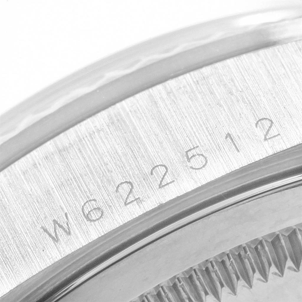 This image shows a close-up of the serial number on the case of the Rolex President 18239 Men's White Gold Silver Dial 18239 Men's White Gold Silver Dial model watch.