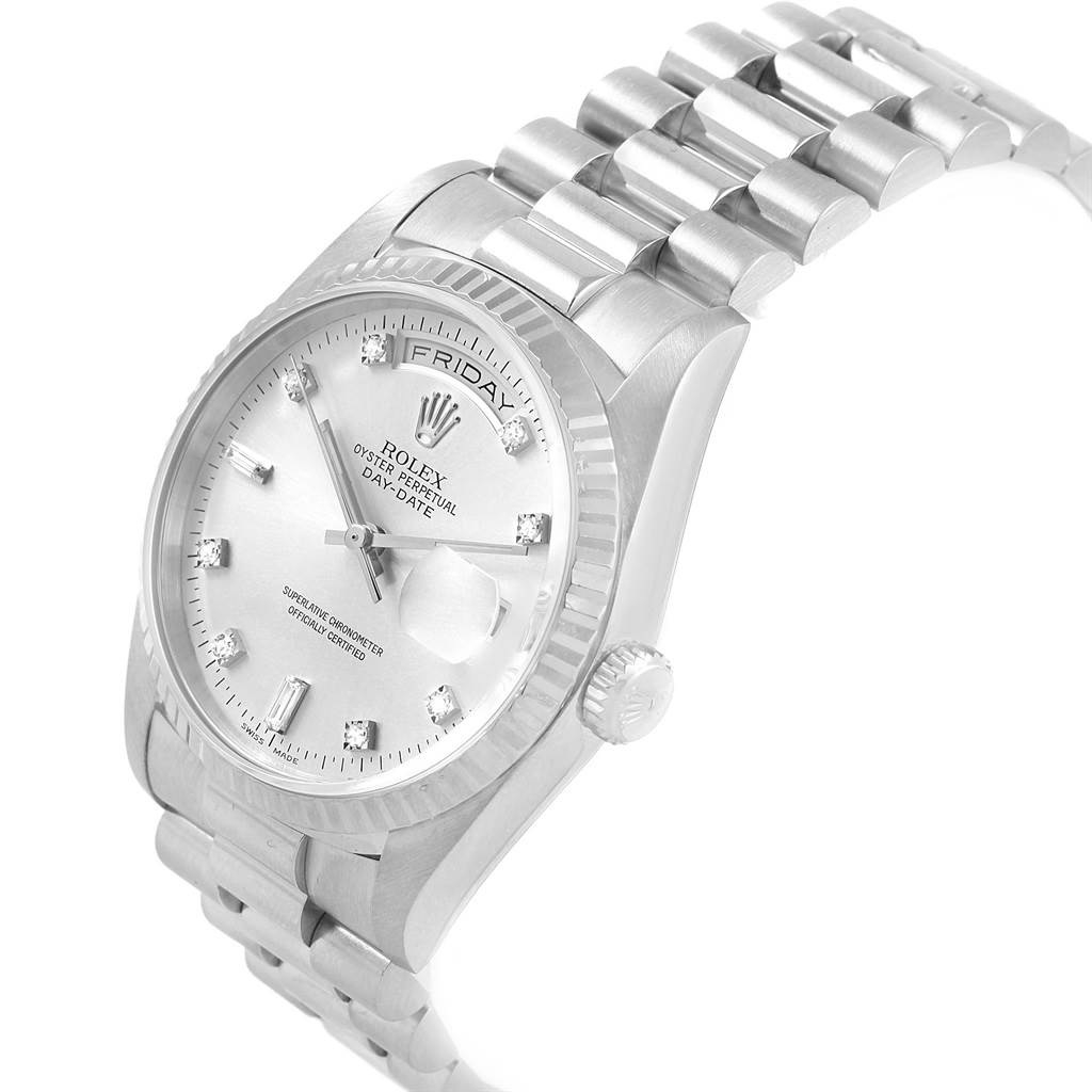 This image shows a Rolex President 18239 Men's White Gold Silver Dial 18239 Men's White Gold Silver Dial Day-Date watch, highlighting its dial, case, bracelet, and fluted bezel from an angled side view.