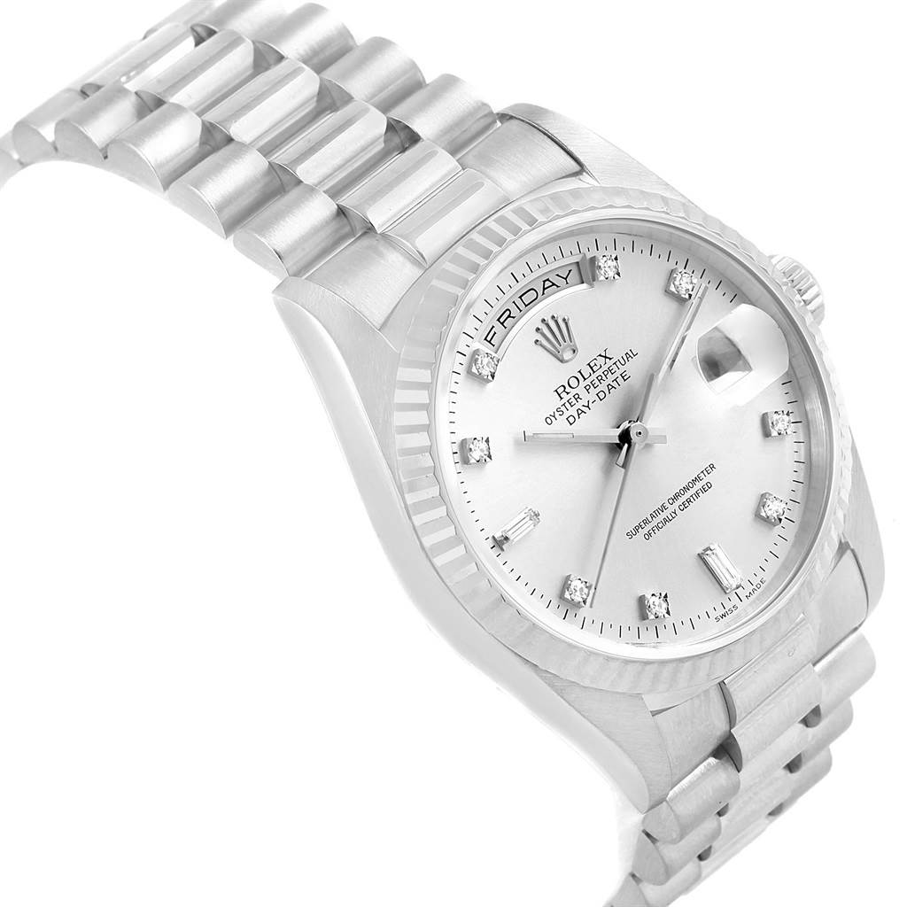 The image shows a side angle of a silver Rolex President 18239 Men's White Gold Silver Dial 18239 Men's White Gold Silver Dial model watch, highlighting its face, bezel, and band.