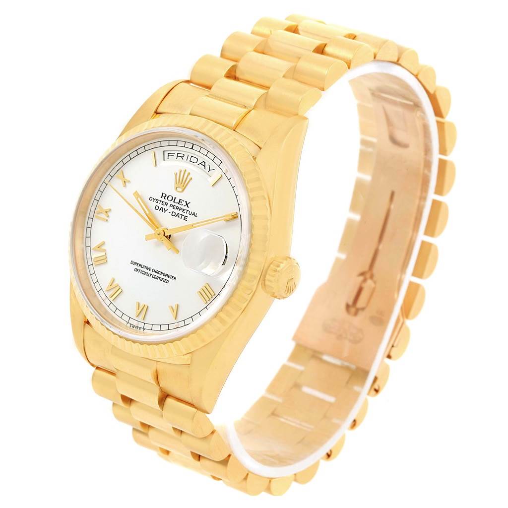 The image shows a Rolex President 18238 Men's Yellow Gold White Dial 18238 Men's Yellow Gold White Dial watch at a three-quarter angle, highlighting the face, bezel, and part of the gold bracelet.