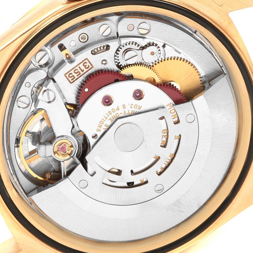 This image shows the internal mechanisms of a Rolex President 18248 Men's Yellow Gold Silver Dial 18248 Men's Yellow Gold Silver Dial model watch from a macro angle.