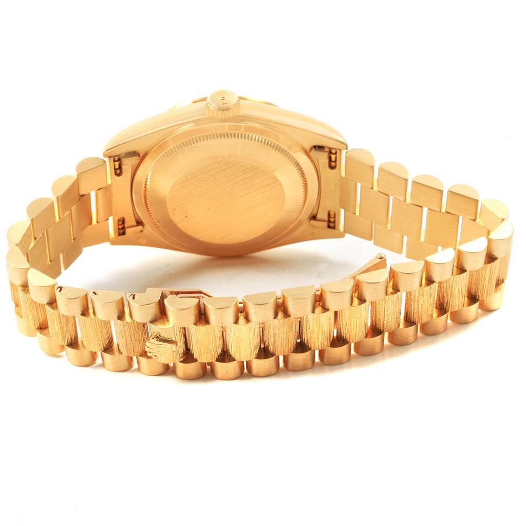 This image shows the back and bracelet of a Rolex President 18248 Men's Yellow Gold Silver Dial 18248 Men's Yellow Gold Silver Dial model watch from a rear angle.
