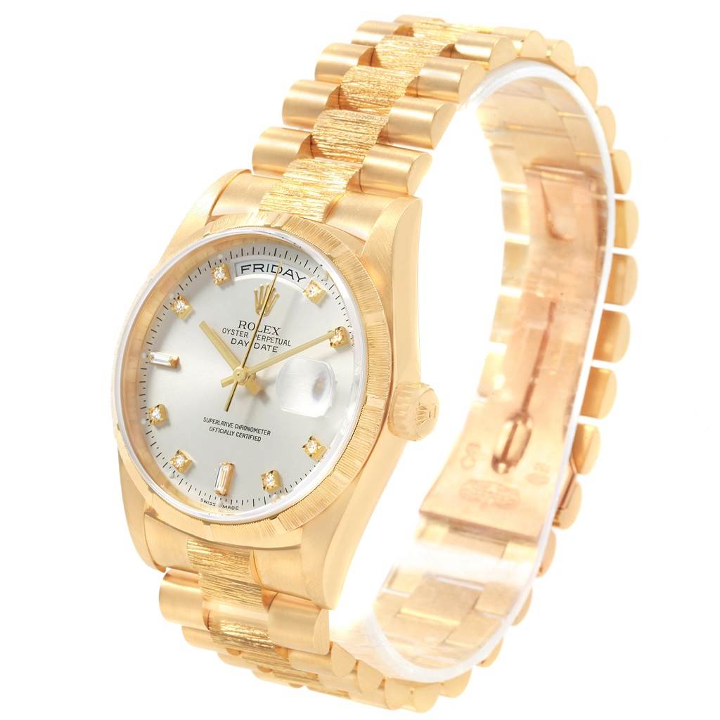 This image shows a President model by Rolex from a front-right angle, displaying its face, bezel, and bracelet.