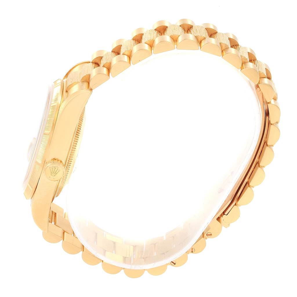 This image shows a side view of the Rolex President 18248 Men
s Yellow Gold Champagne Dial 18248 Men
s Yellow Gold Champagne Dial model watch, highlighting its gold case and bracelet.