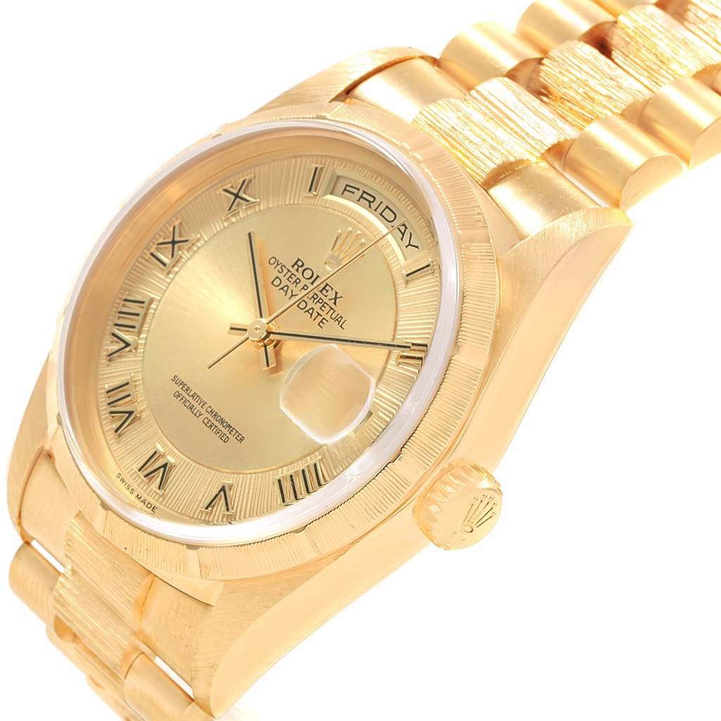 The image shows a close-up of the Rolex President 18248 Men
s Yellow Gold Champagne Dial 18248 Men
s Yellow Gold Champagne Dial model, highlighting the gold bracelet, dial, and day-date feature.