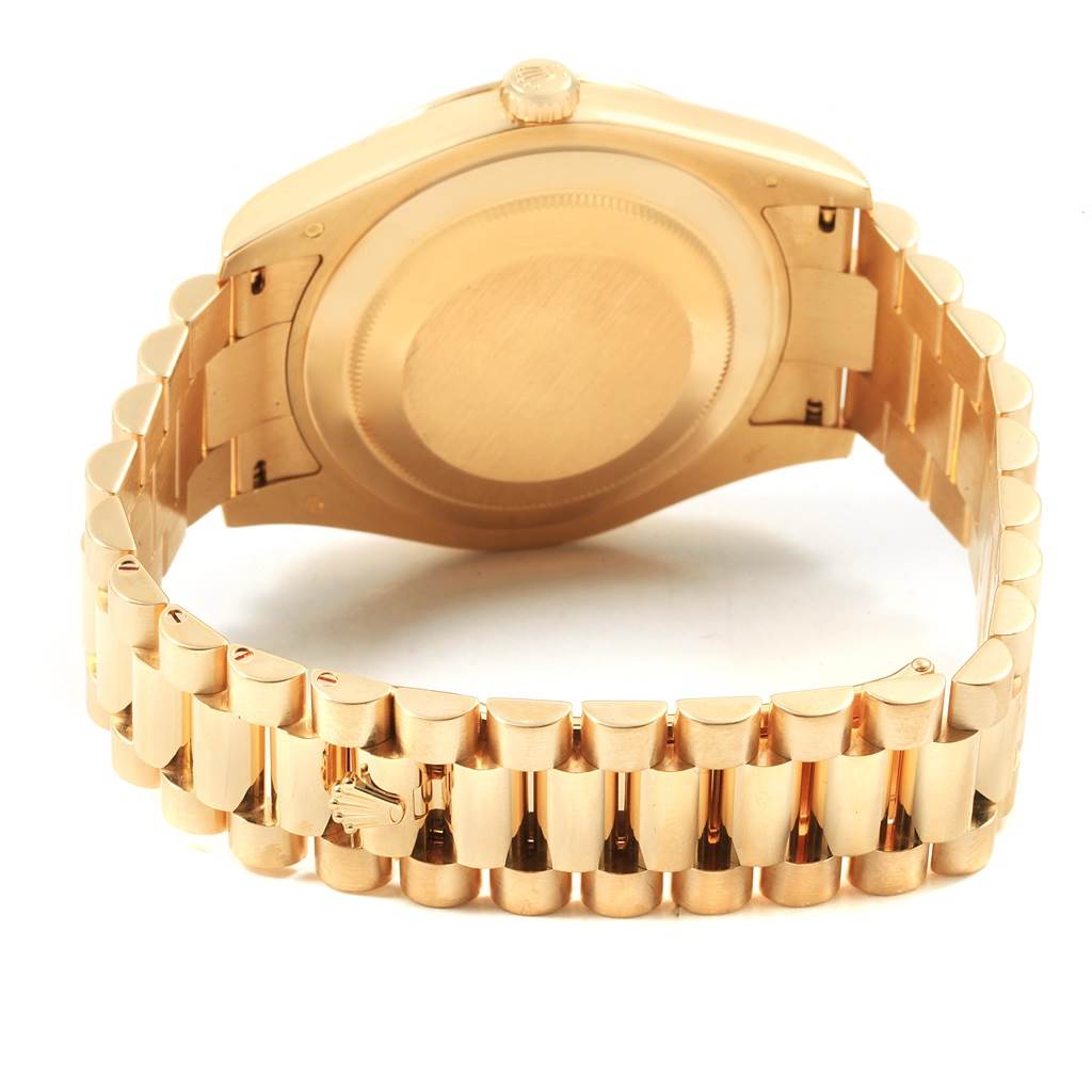 This image shows the back case and bracelet of a Rolex President 218238 Men's Yellow Gold Champagne Dial 218238 Men's Yellow Gold Champagne Dial model watch from a rear angle.