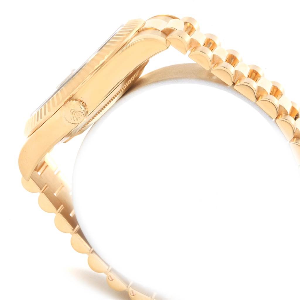 This image shows a side view of the President model by Rolex, highlighting the watch case and the bracelet links.